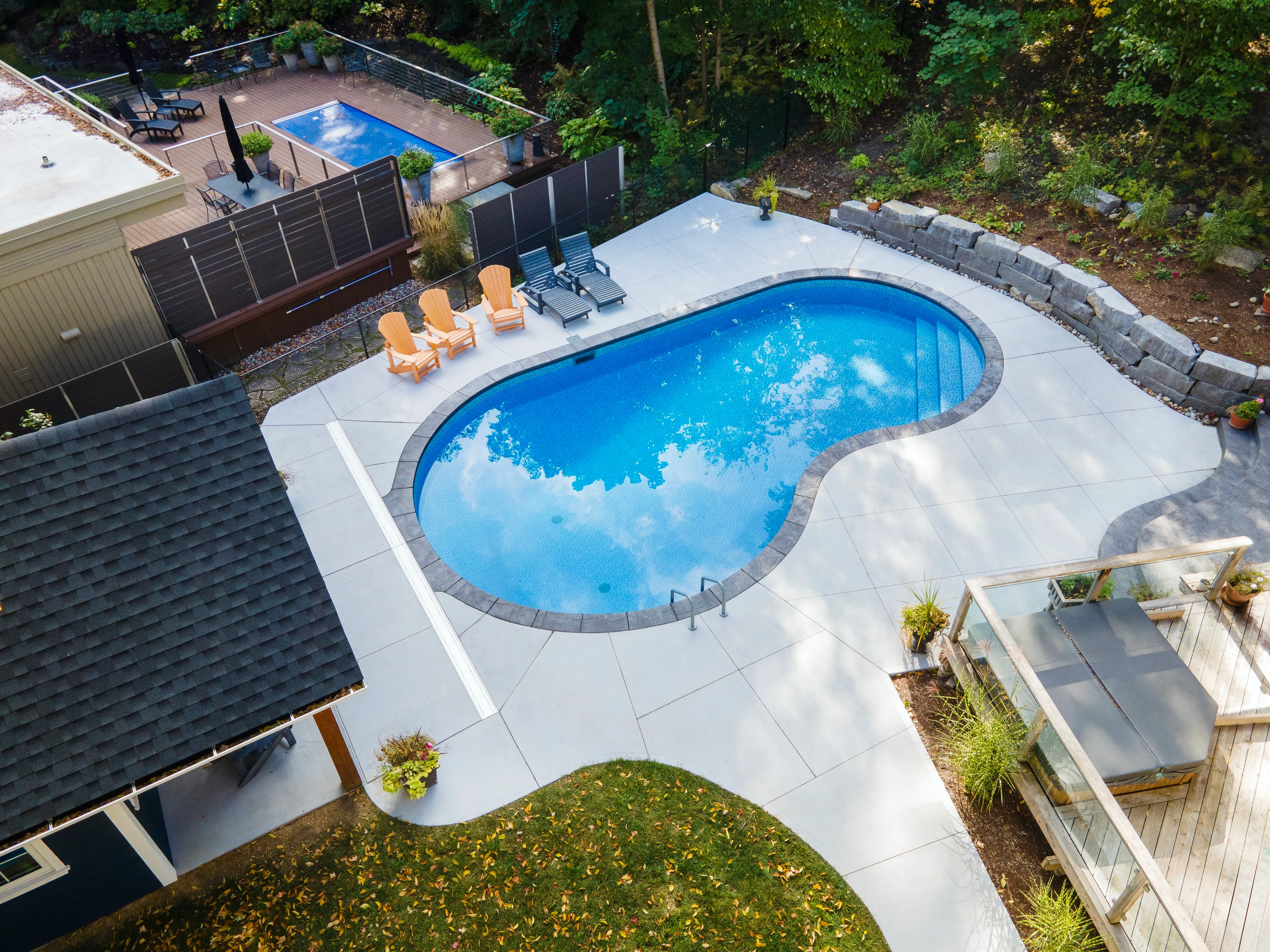 Pool technician servicing equipment in Waterloo Region — Aquascapes Recreational Contractors