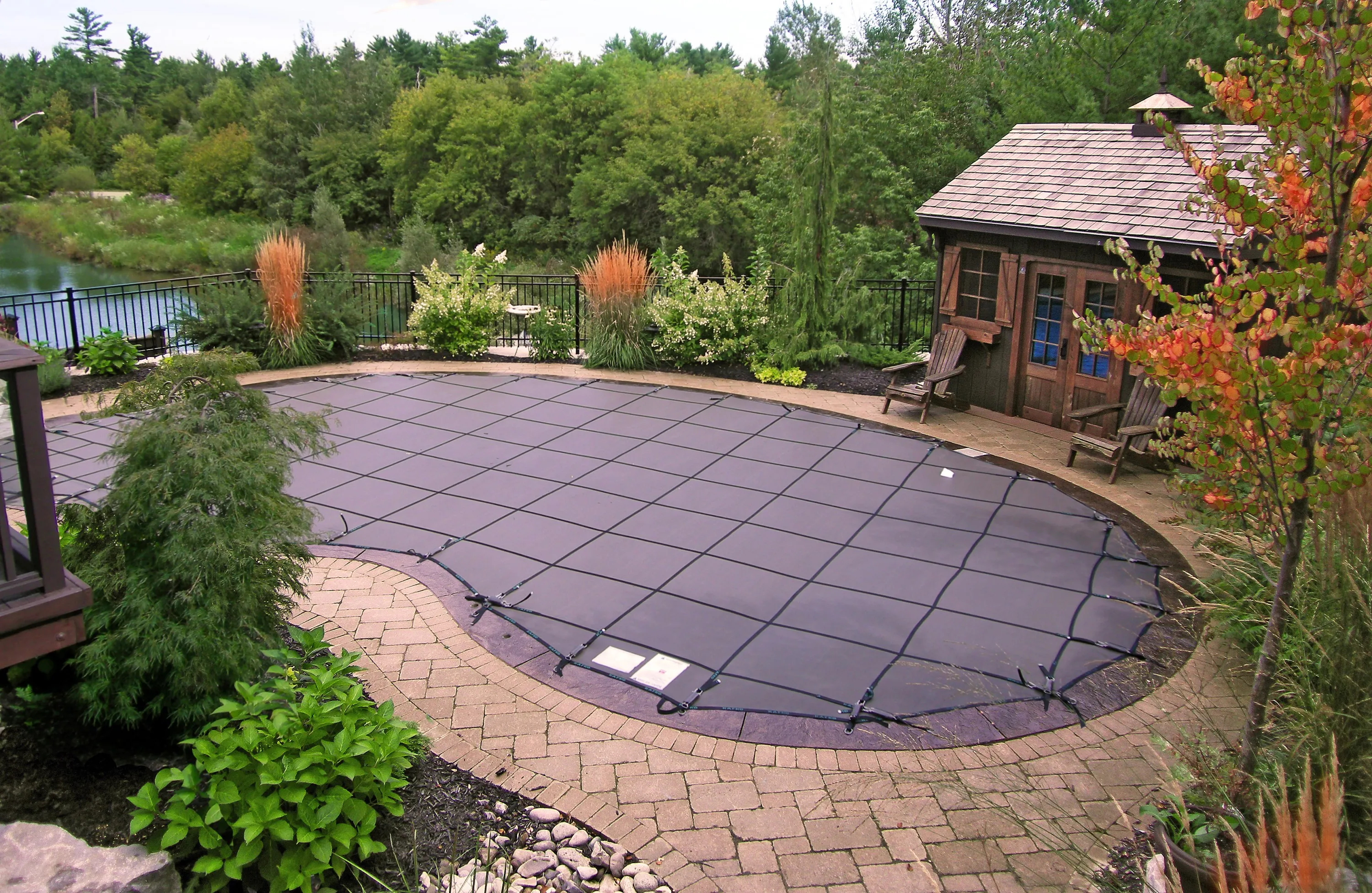 Safety cover installed on a pool — Aquascapes Recreational Contractors, Waterloo Region
