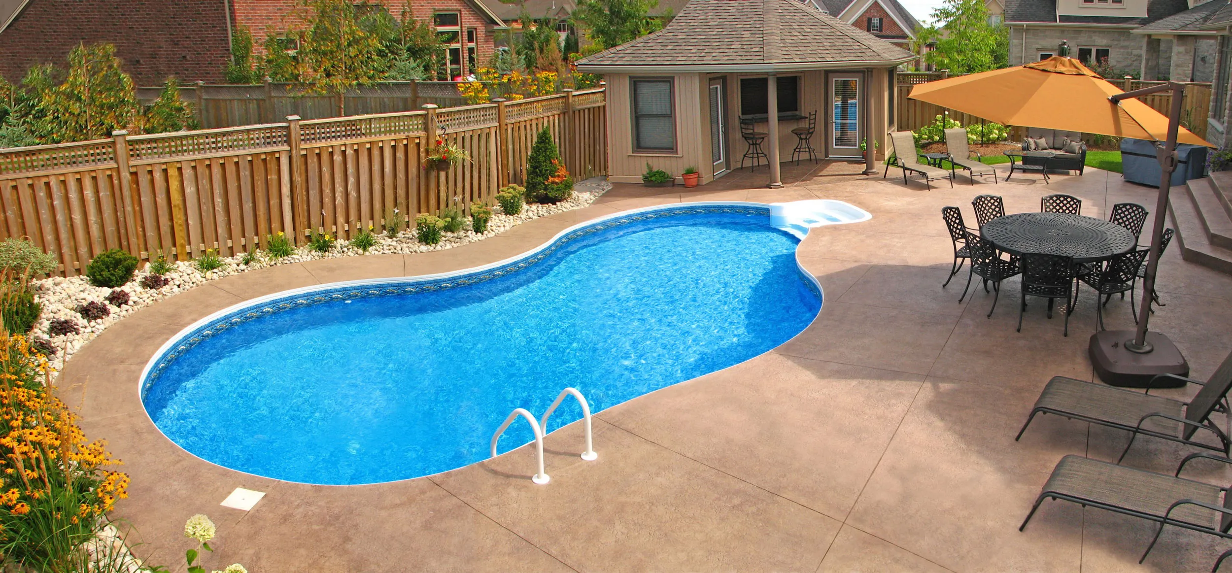 Mountain Lake — stamped concrete deck, pool house