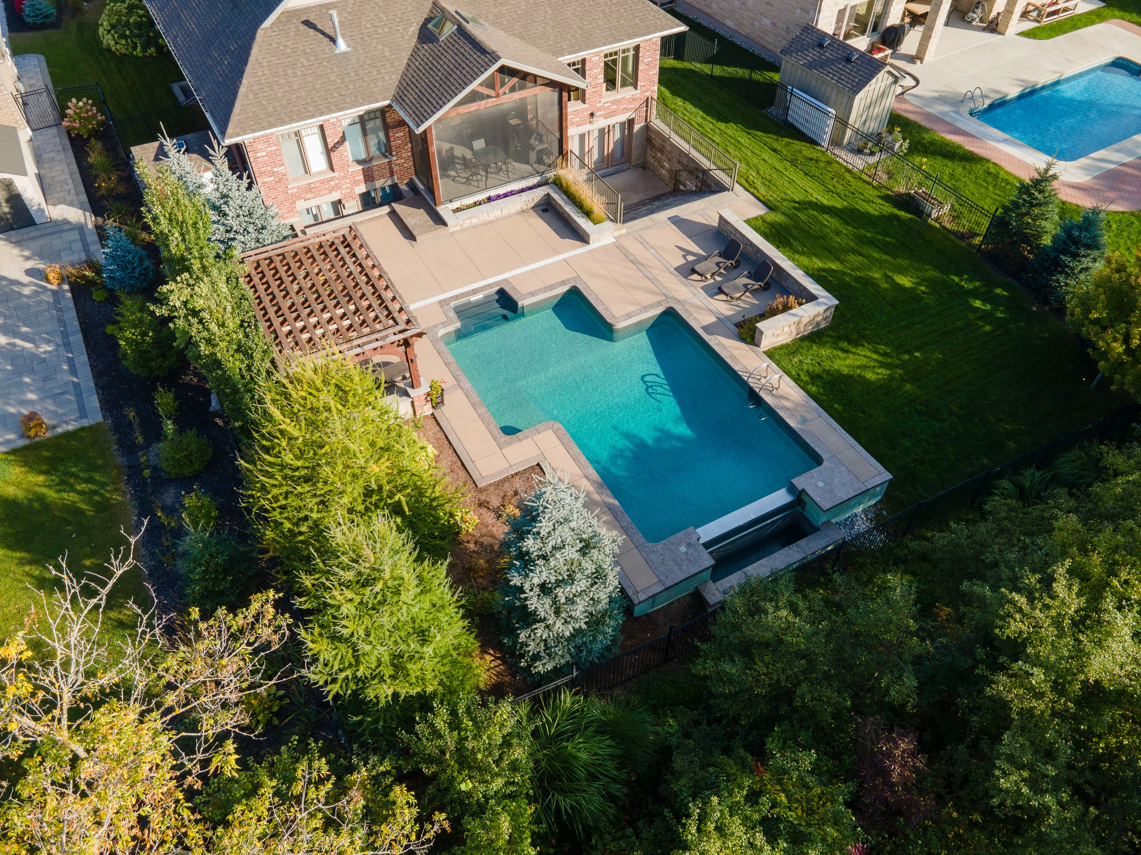 Custom pool in a Waterloo Region neighbourhood — Aquascapes Recreational Contractors